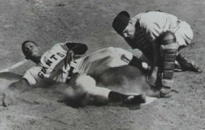 Willie Mays slides Home